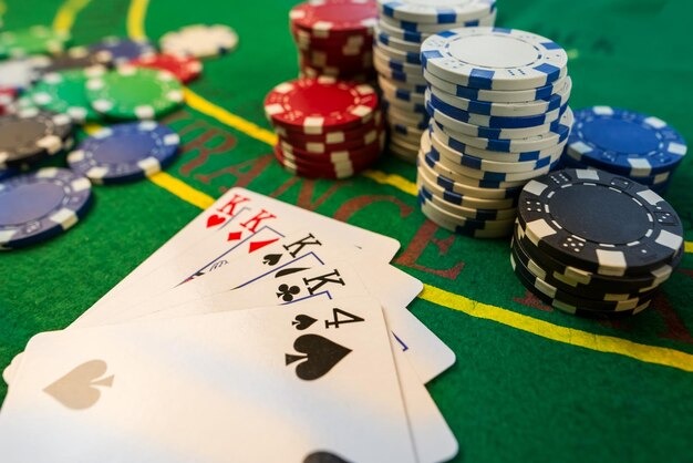 Close-up of card layout showing blackjack hand in progress with player and dealer cards